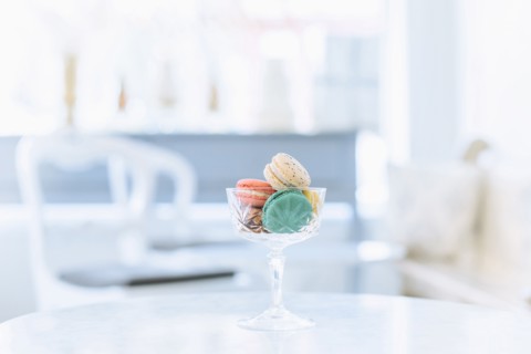 Variety of macaroon cookies in glass