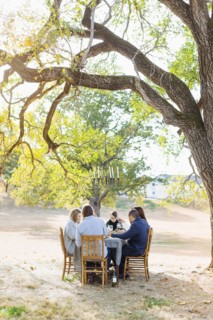 Friends eating at outdoor table