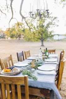Empty dinner table in field