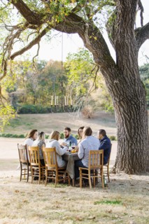 Friends eating at outdoor table