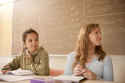 Students studying in classroom
