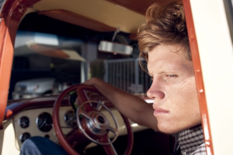Caucasian man sitting in truck