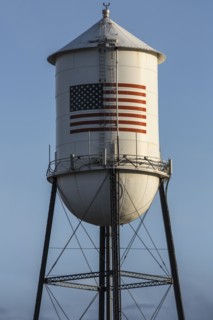 American flag on water tower