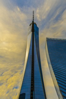 Urban skyscraper and cloudy sky
