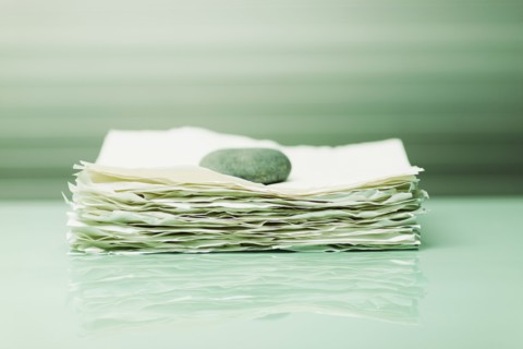 Stone on papers