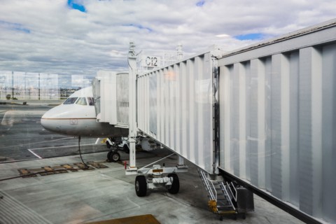 Walkway to airplane on runway