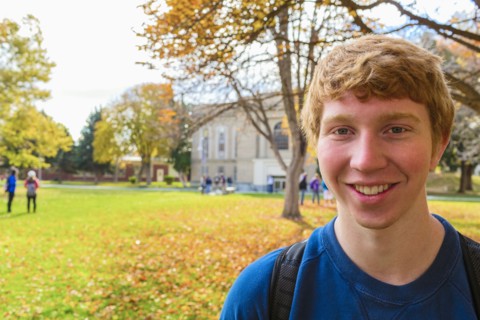 Student smiling on campus