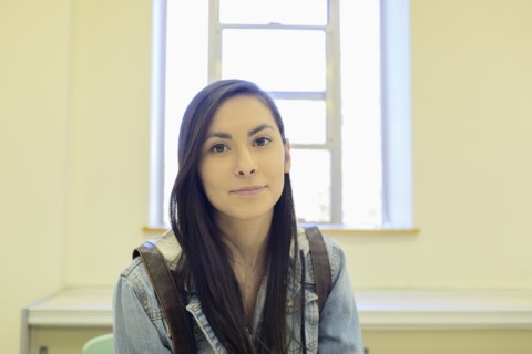 Middle Eastern student sitting in classroom