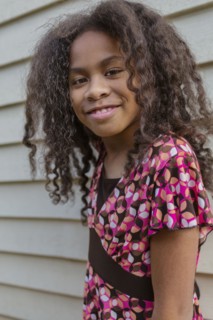 Pacific Islander girl smiling outdoors