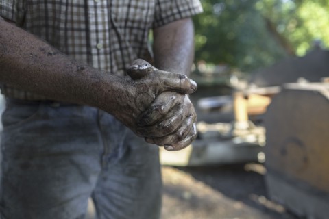 Greasy hands of Caucasian man