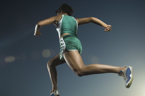 African American female athlete running