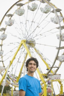 Mixed Race teenaged boy at carnival