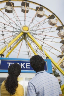Mixed Race teenaged couple at carnival