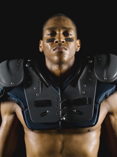 African football player wearing protective pads
