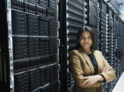 Indian businesswoman standing in server room