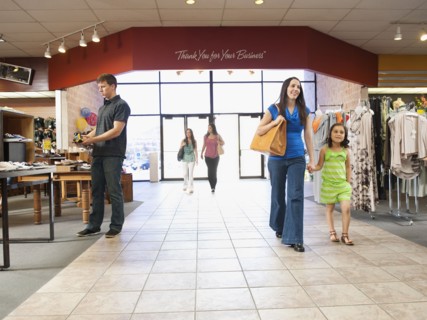 People shopping in clothing store
