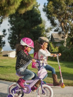 Mixed race girls playing outdoors