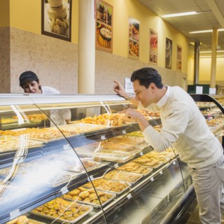 Customer ordering at restaurant counter