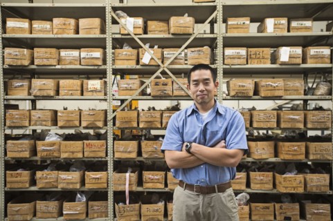 Chinese worker smiling in textile factory