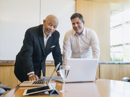 Businessmen talking in meeting