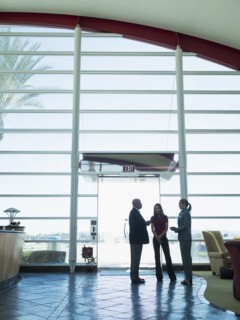 Business people talking in airport