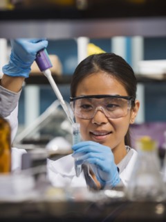 Japanese scientist working in laboratory