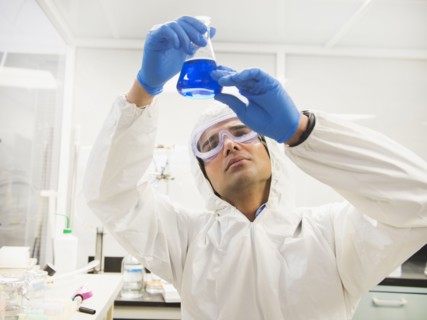 Indian scientist working in laboratory