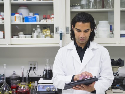Indian scientist working in laboratory