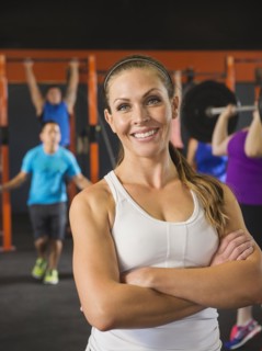 Woman smiling in gym