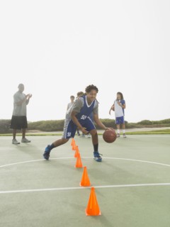 Basketball team doing drills at practice