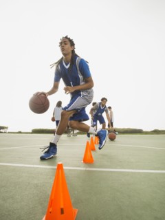 Basketball team doing drills at practice