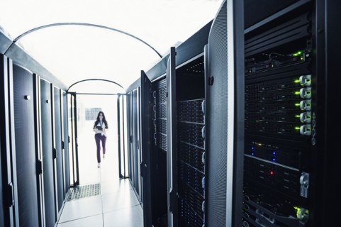 Technician walking in server room