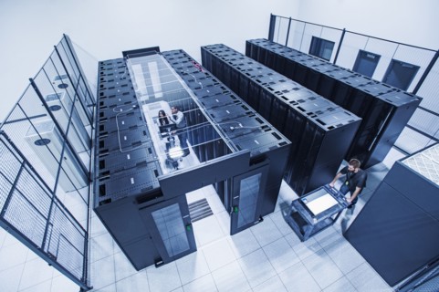 High angle view of technicians working in server room