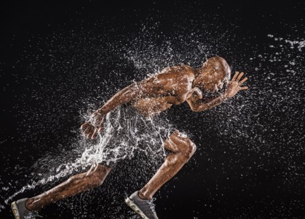 Water splashing on black runner