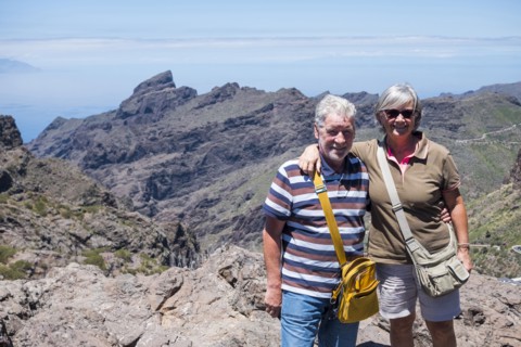 Portrait of smiling older Caucasian couple on mountain