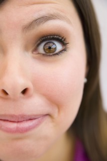 Close up of grinning Hispanic woman