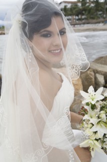Hispanic bride in wedding dress