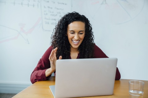 Mixed race businesswoman on video conference