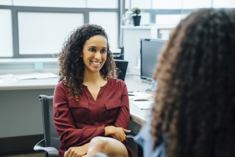 Businesswomen talking in office