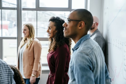 Business people near whiteboard