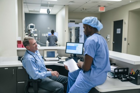 Doctor and nurse talking