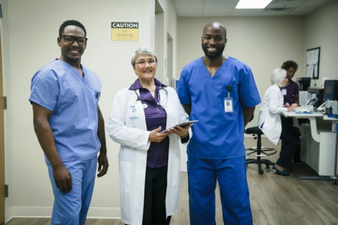 Portrait of smiling doctor and nurses