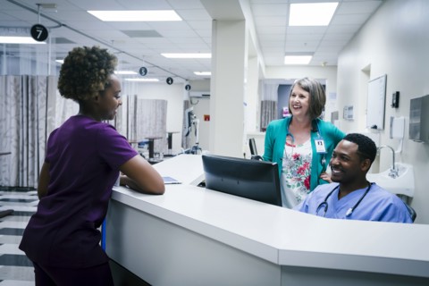 Doctor and nurses talking in hospital