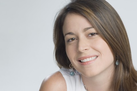 Close up of Hispanic woman smiling