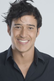 Hispanic man with messy hair