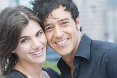 Close up of Hispanic couple smiling
