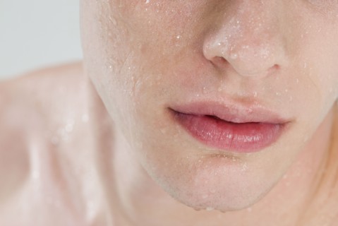 Close up of man's wet face