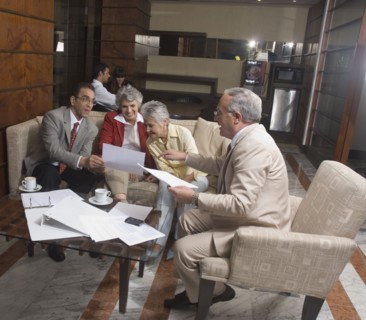 Hispanic businesspeople having meeting