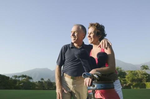 Multi-ethnic couple on golf course