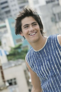 Hispanic teenager with eyebrow piercing